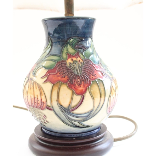 866 - Moorcroft ceramic table lamp on turned wooded base