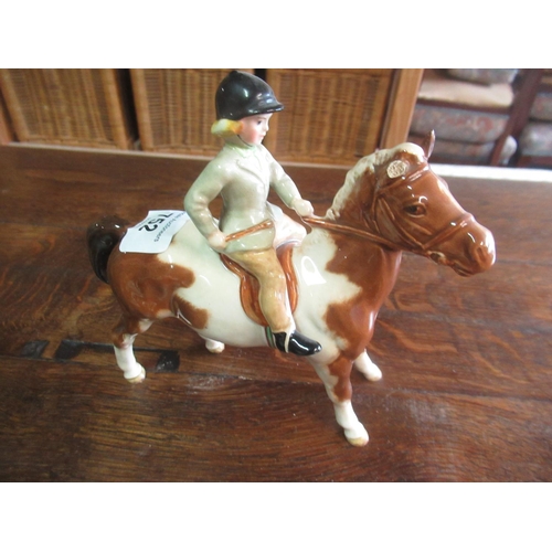 752 - Three Beswick models, including two of boy on pony, in palomino colourway, model nos. 1500, one seco... 