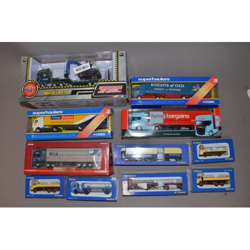 892 - Eleven boxed die-cast vehicles in 1/50, 1/64 and 1/76 scales. Mostly Corgi and B-T Models.