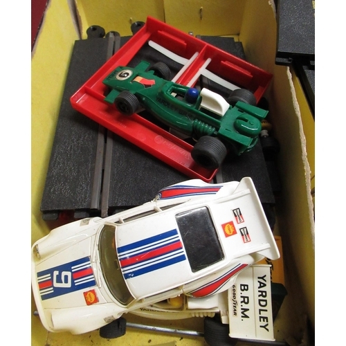 923 - Scalextric Pole Position circuit track and cars in original box together with similar Scalextric veh... 