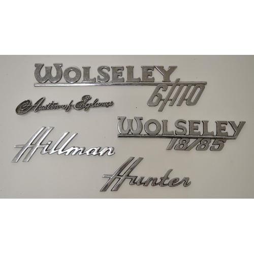 813A - Five vintage chromed car manufacturers signs including Wolsey 6/110, Hillman Hunter, Austin of Engla... 