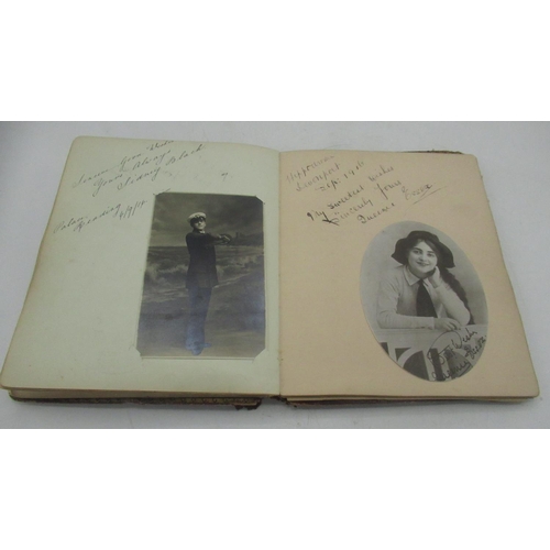1007 - Maroon photo album containing various signatures and sketches from the early 1900s, inc. Matt Powell... 