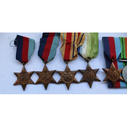 56 - Large collection of WWII medals including two Defence medals, three 1939 - 1945 War medals and five ... 