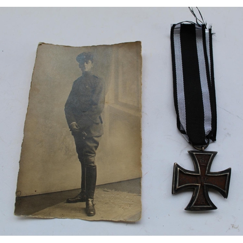 58 - 1914 Iron Cross with photograph of young German soldier