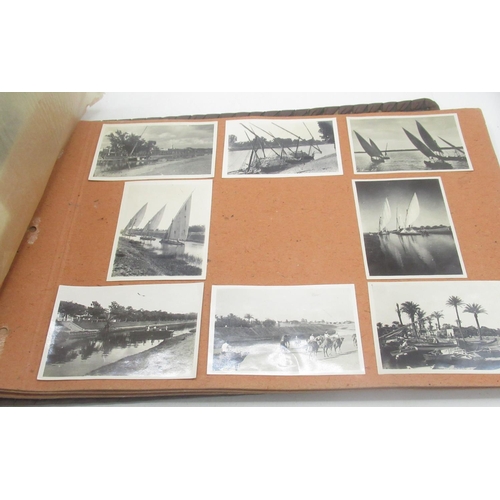 1015 - Brown leather photo album of Egypt, Tel-Aviv, containing photos of Sunset on the Nile, Luxor, Ben Je... 