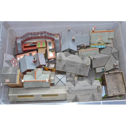 784 - Large collection of OO gauge railway buildings, mostly card and built to an excellent standard, some... 