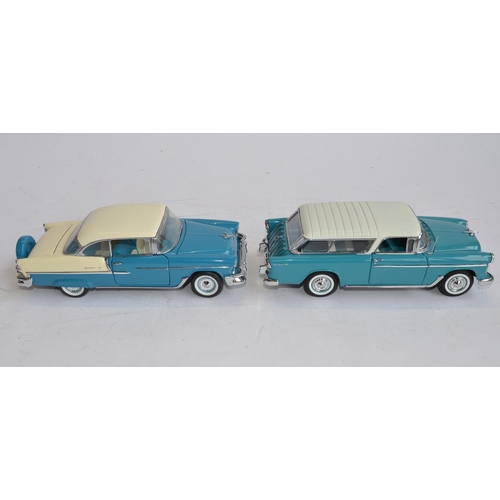 854 - 2 boxed 1/24 die-cast model cars:
Danbury Mint 1955 Chevrolet Nomad with paperwork. Excellent condit... 