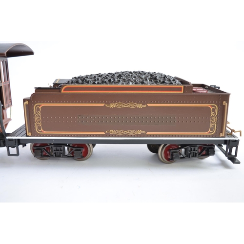 657 - A Bachmann G-gauge (Narrow scale) Baldwin 4-6-0 loco with tender. Tender lettering overpainted. Fair... 