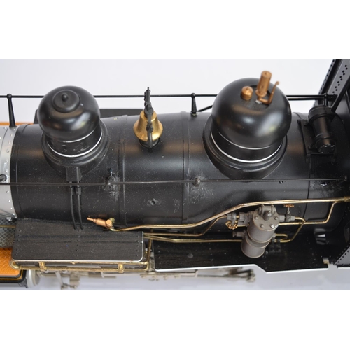 658 - A Bachmann G-gauge Baldwin 4-6-0 and tender. Some modifications and re-painting/over painting of let... 