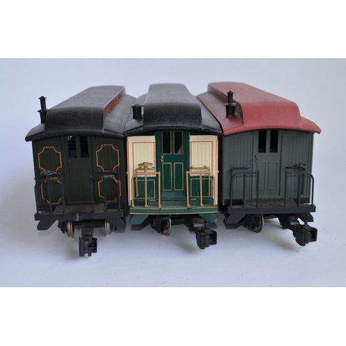 675 - 3 G gauge Bachmann twin bogie passenger coaches, no boxes. One has been re purposed as a Northeast c... 