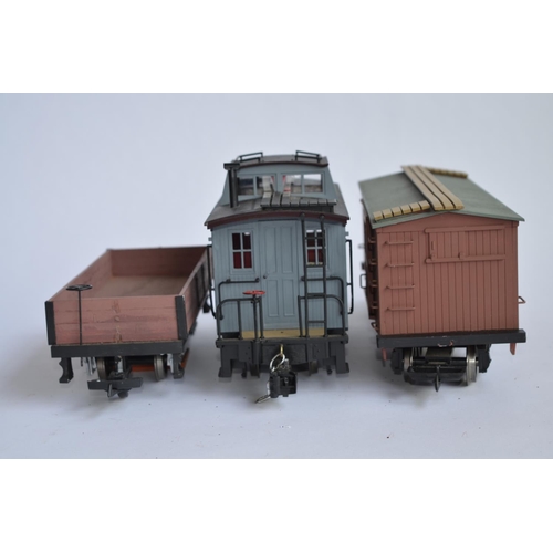 677 - 3 G-gauge railway wagons, 1 by Bachmann, 2 by Aristo including a track cleaning wagon. Both brown wa... 