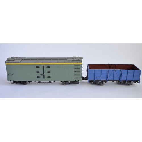 679 - 2 boxed G gauge twin bogie wagons, 1 an LGB open wagon, the other closed by Bachmann. Both re-painte... 