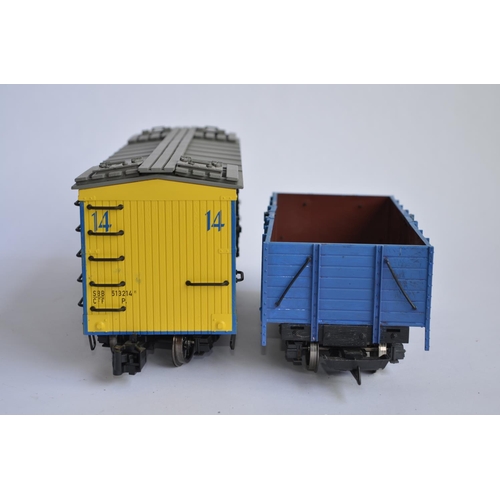 679 - 2 boxed G gauge twin bogie wagons, 1 an LGB open wagon, the other closed by Bachmann. Both re-painte... 