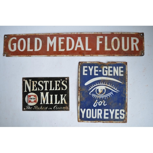 977 - 3 enamelled steel plate advertising signs. Gold Medal Flour (W61.2x10.2cm), Nestle's Milk (W20.3xH14... 