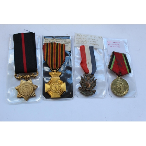 57 - Collection of four medals, including 20th anniversary Victory of WWII medal, French 1870 - 1871 Oubl... 