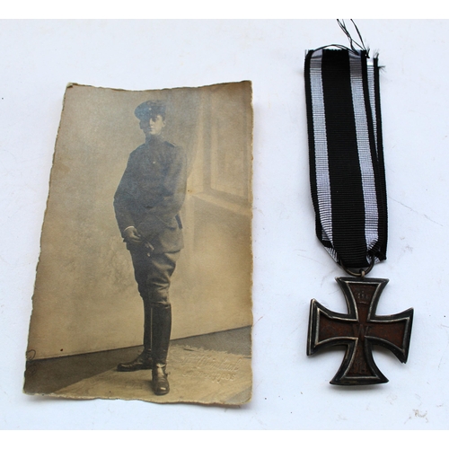 58 - 1914 Iron Cross with photograph of young German soldier