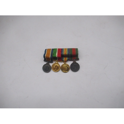 63 - Four miniature medals - 1914 - 1920 British War medal, Mercantile Marine war medal, Victory medal, D... 