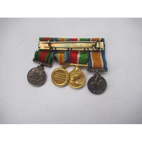 63 - Four miniature medals - 1914 - 1920 British War medal, Mercantile Marine war medal, Victory medal, D... 