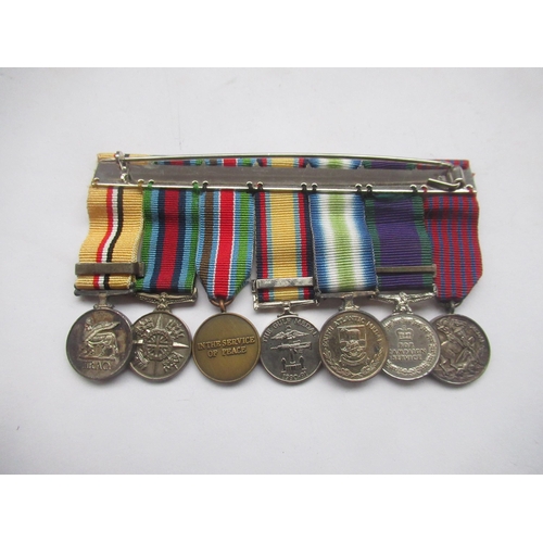 74 - Collection of seven miniature medals incl. Iraq medal, Gulf medal etc.