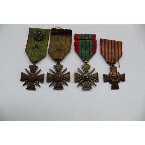77 - Four medals incl. Croix De Guerre, two from 1914-1918 one Croix De Combatant