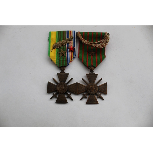 79 - Pair of Croix de Guerre both dated 1914-1918 incl extra stars on ribbon and olive branch