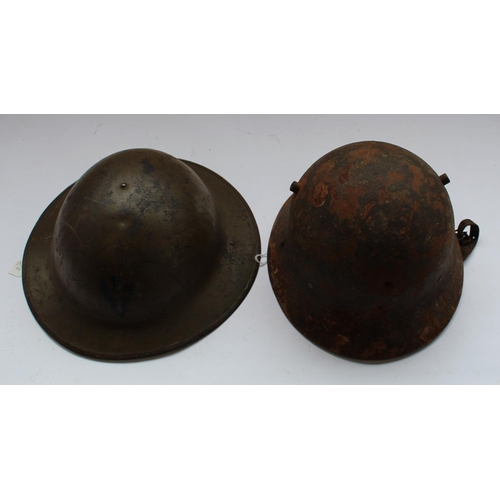 141B - Two WWII steel helmets (A/F)