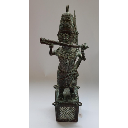 154A - Large Benin bronze figure playing ceremonial pipe