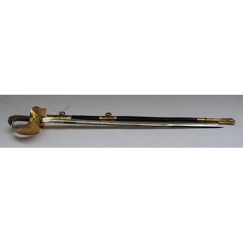 180 - RAF officers ERII dress sword with leather and brass scabbard