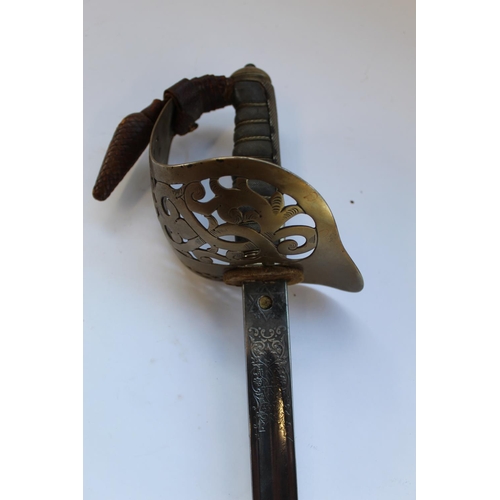 236 - An officers dress sword by Wilkinson's of Pall Mall in leather scabbard and frog 