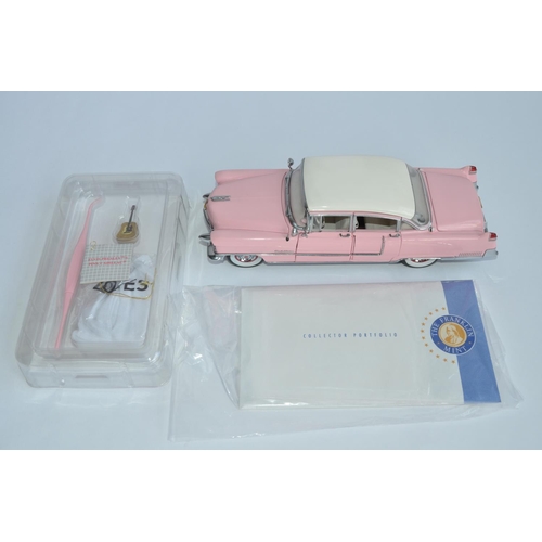 814A - A Franklin Mint 1/24 Elvis Presley 1955 Pink Cadillac diecast model car, with box, paperwork and all... 
