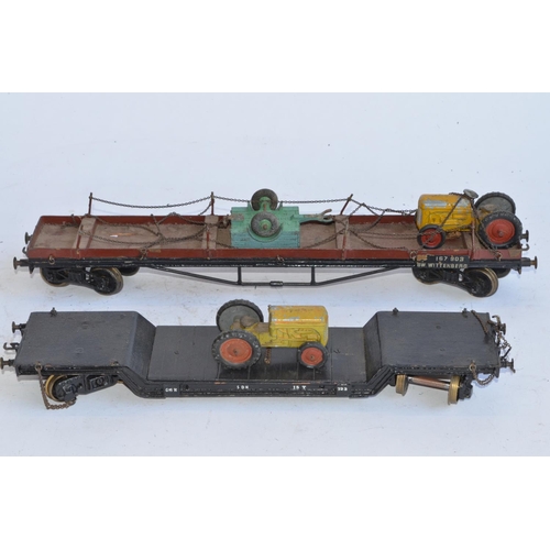 696 - A collection of O gauge track, wagons and a Lima diesel shunter. Includes a boxed Rovex RV 257 passe... 