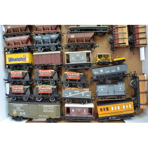 776 - A collection of used OO gauge rolling stock, wagons etc including a Tri-Ang snow plough and 3 boxed ... 