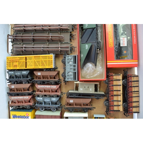 776 - A collection of used OO gauge rolling stock, wagons etc including a Tri-Ang snow plough and 3 boxed ... 