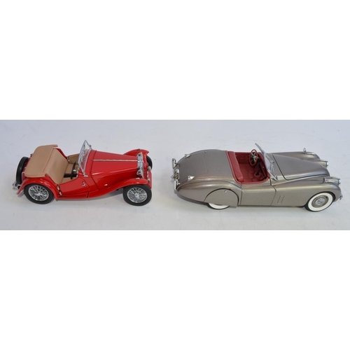 848 - 3 1/24 Franklin Mint die-cast model cars, no boxes/paperwork:
A 1948  MGTC Roadster in near mint con... 