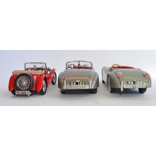 848 - 3 1/24 Franklin Mint die-cast model cars, no boxes/paperwork:
A 1948  MGTC Roadster in near mint con... 