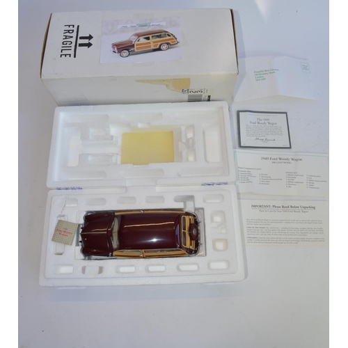 849 - A boxed 1/24 Franklin Mint 1949 Woody Wagon, with paperwork.