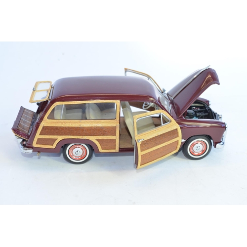 849 - A boxed 1/24 Franklin Mint 1949 Woody Wagon, with paperwork.