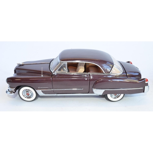 850 - 3 1/24 die-cast cars. 
Boxed Danbury Mint 1949 Mercury Club Coupe, with certificate. Damage/repairs ... 