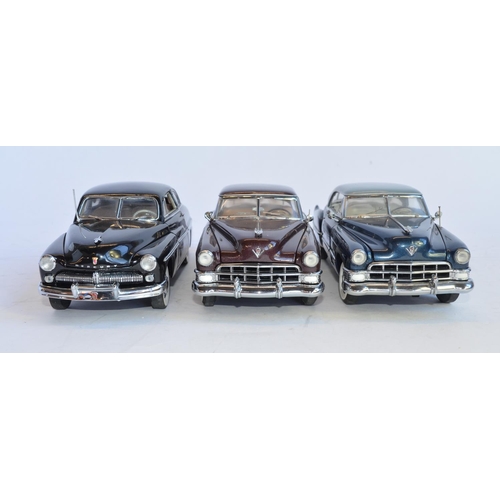 850 - 3 1/24 die-cast cars. 
Boxed Danbury Mint 1949 Mercury Club Coupe, with certificate. Damage/repairs ... 