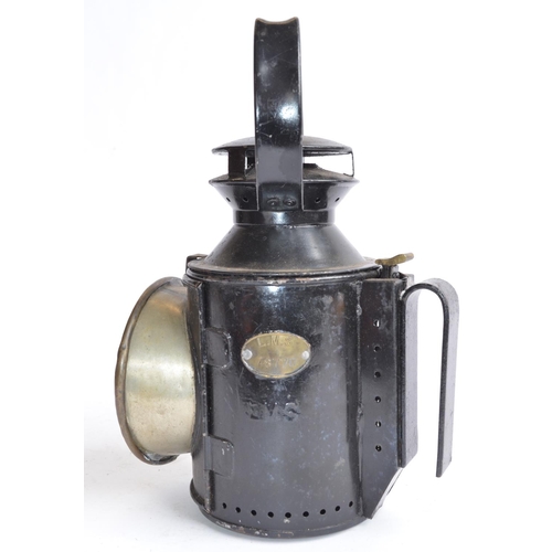 804 - A vintage LMS railway lamp with brass plate attached 'LMS 48770'. Height to handle top 29cm.