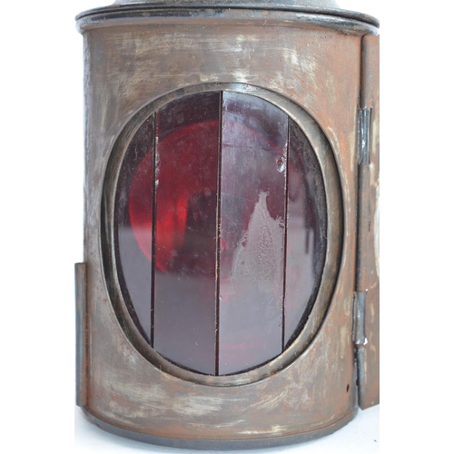 805 - An LMS Railways signal lamp, plate stamped 'R204'. Height to handle top 29cm.