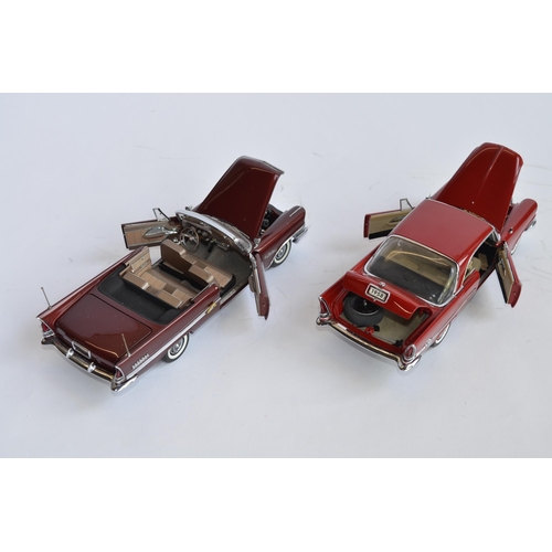 865 - 2 boxed Danbury Mint 1/24 diecast car models:
1958 Chrysler 300D Sport Coupe, good condition, some r... 