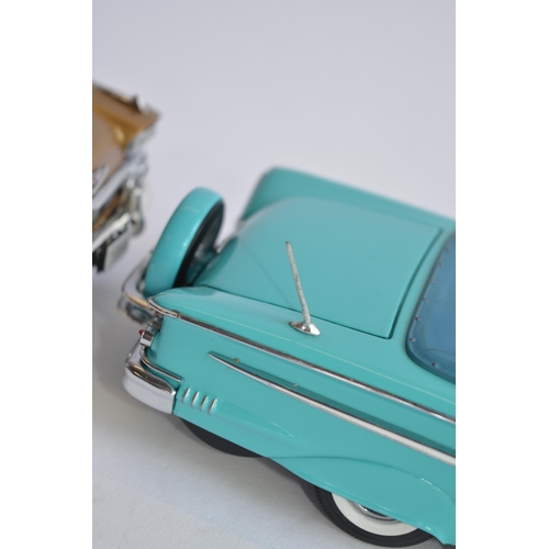 866 - 3 1/24 diecast model cars:
2 x Danbury Mint 1958 Chevy Impalas, one blue, the other gold, both with ... 