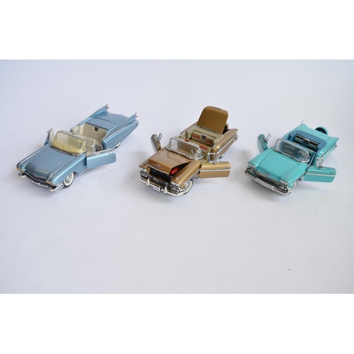 866 - 3 1/24 diecast model cars:
2 x Danbury Mint 1958 Chevy Impalas, one blue, the other gold, both with ... 