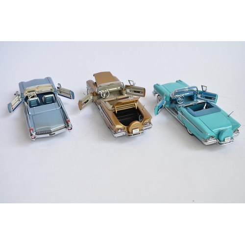 866 - 3 1/24 diecast model cars:
2 x Danbury Mint 1958 Chevy Impalas, one blue, the other gold, both with ... 