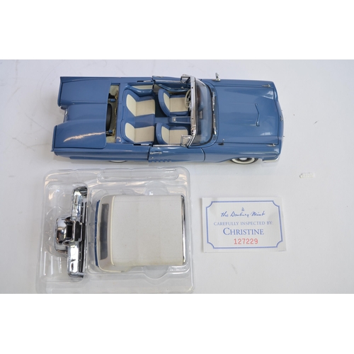 869 - 3 boxed 1/24 diecast car models:
A Danbury Mint 1958 Ford Thunderbird convertible. Good overall cond... 