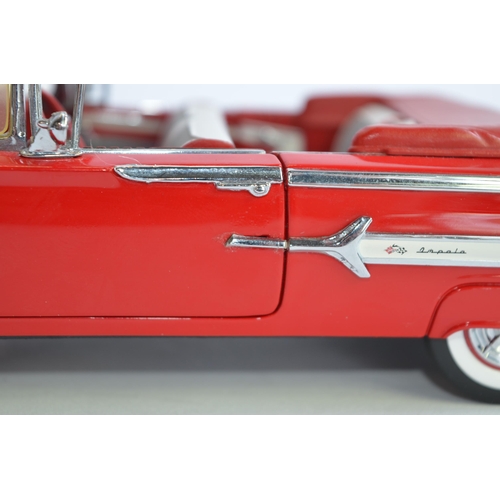 871 - 3 unboxed Franklin Mint 1/24 scale die-cast model cars:
A red 1960 Chevy Impala convertible, good co... 