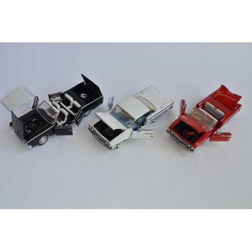 871 - 3 unboxed Franklin Mint 1/24 scale die-cast model cars:
A red 1960 Chevy Impala convertible, good co... 