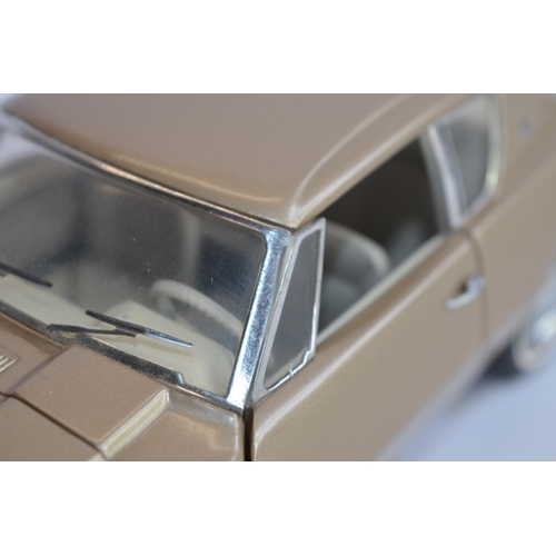 873 - 3 boxed 1/24 die-cast model cars:
Danbury Mint 1965 Pontiac GTO, good box, no paperwork. Wing mirror... 