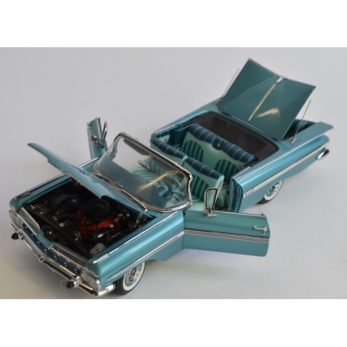 859 - A Danbury Mint 1/24 diecast 1959 Chevrolet Impala Convertible, boxed with COA and roof.